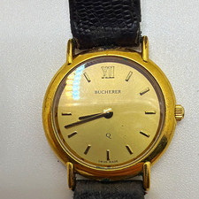 Bucherer Q Swiss Made Quartz Sapphire Crystal Gold Tone Analog Black Leather