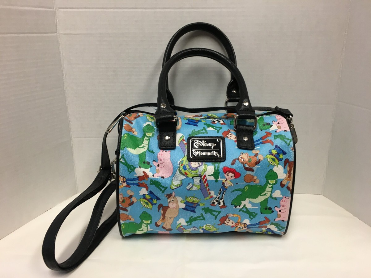 *RETIRED* Loungefly Disney Toy Story Heart Backpack - Light Blue and Navy Amazon.com: Loungefly Toy Story x Tiny Tan Mini Backpack  main image 4