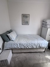Single bed with pull-out to convert into a double or two singles