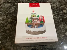 2024 Hallmark SANTA'S SEASIDE CARNIVAL MUSICAL W/LIGHT AND MOTION. W/BATTERIES
