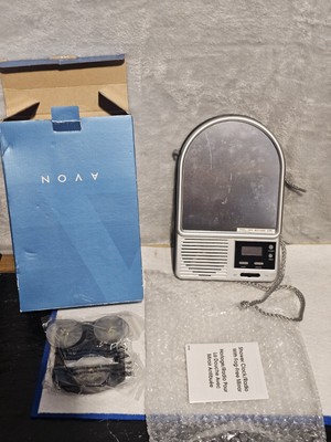 Avon Shower Clock Radio with a Fog-Free Mirror.