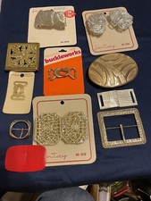 Vintage lot of 11 belt buckles metal  plastic Various Colors  Styles.  P 12