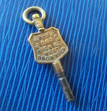 Advertising Pocket Watch Key - H. Brugger , High St. , West Bromwich Midlands