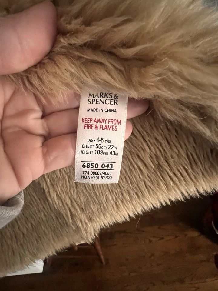Abrigo Marks and Spencer de piel de oveja sintética para niños Foto 3 de 4