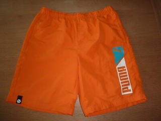 "PUMA" SPORT LIFESTYLE SHORTS/SPORTHOSE KURZ GR. 48/50= M ORANGE POLYESTER