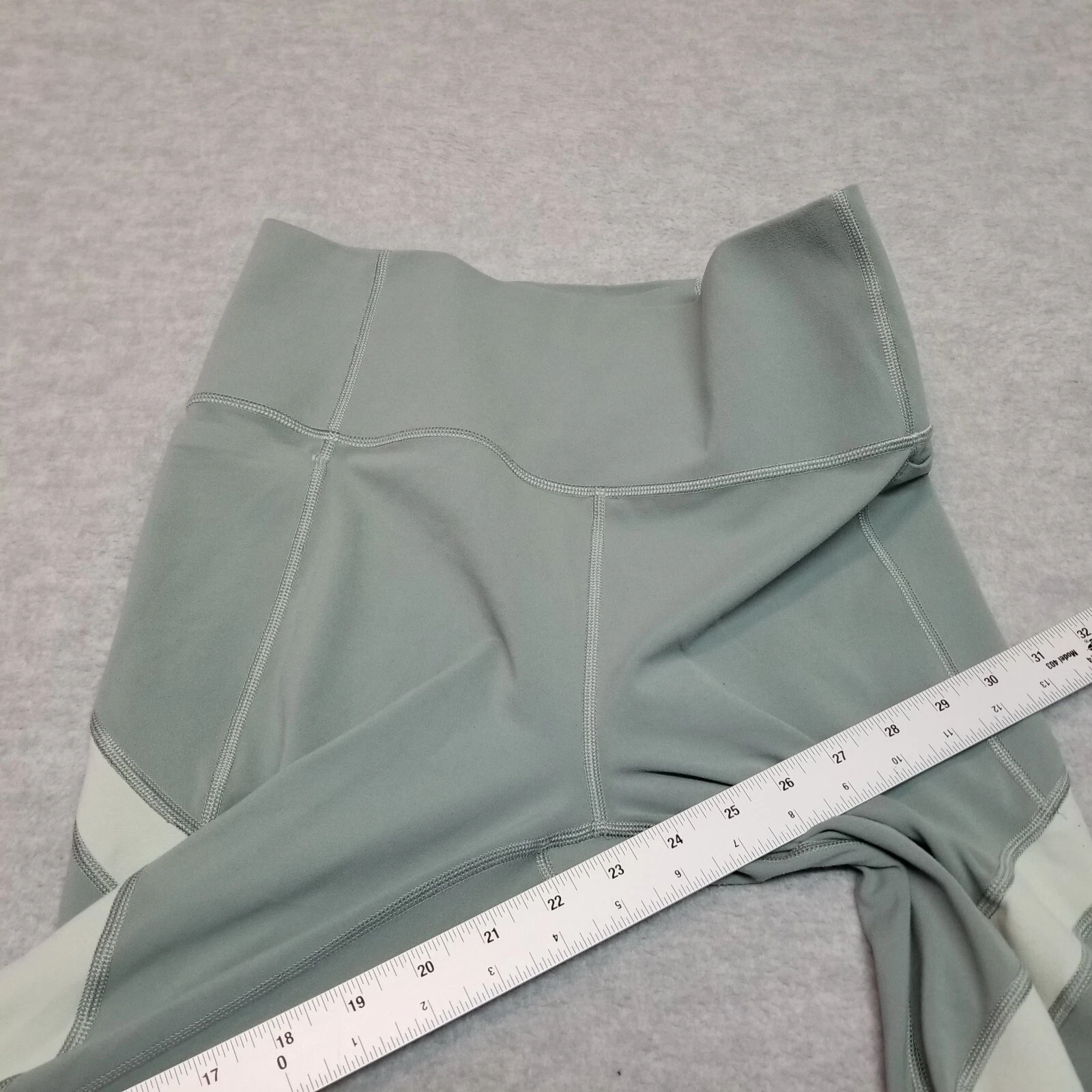 athleta salutation stash pocket 7/8 tight leggings