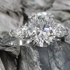 3.25 CTW Oval Cut Moissanite Three Stone Engagement Ring 14K White Gold Plated