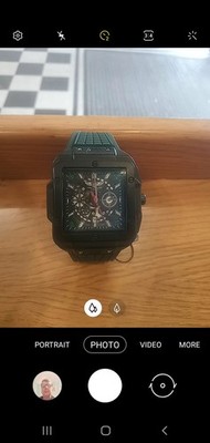 Men's square skeleton style watch with rubber strap: large face.