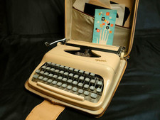 rare vintage slim portable Trixi enameled metal tipewriter  thumbnail