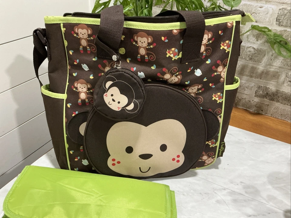 Bolsa de pañales Babyboom Monkey/bolso de viaje biberón chupete estuche cambiador almohadilla marrón Foto 2 de 4