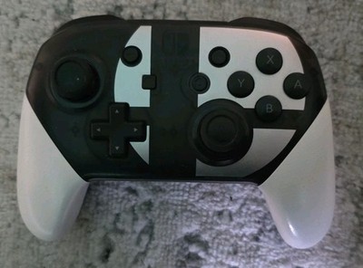Nintendo Switch Pro Controller - Super Smash Bros Ultimate Edition - Grau/Weiß
