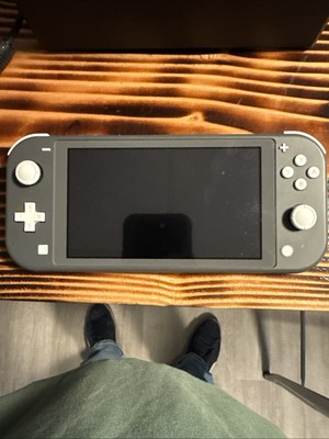 Nintendo Switch Lite! Tested And Working Needs Charger factory reset!