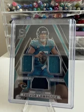 2024 Spectra | #TT-TLE Trevor Lawrence (Triple Threats Silver /99) JAX Jaguars