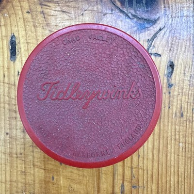 Ein rotes Bakerlite Chad Valley Tiddlywinks Spiel