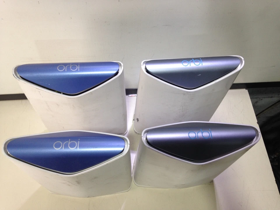 LOT OF 4:  NETGEAR OBI PRO ROUTERS (2x) SRR60 AND (2x) SATELLITE SRS60 - USED - Image 2 of 4