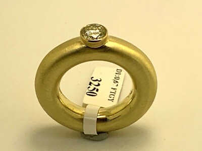 MODERN DESIGN SOLITAIRE RING,WITH 0.67 CT. BRILLIANT NATURAL YELLOW,14ct.585 GOLD 