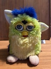 vintage 1998 "Kiwi" Furby features lime green body, yellow belly, and blue tuft