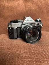Canon AE-1 Program 35mm SLR Film Camera Black Silver with 50mm f/1.8 Lens