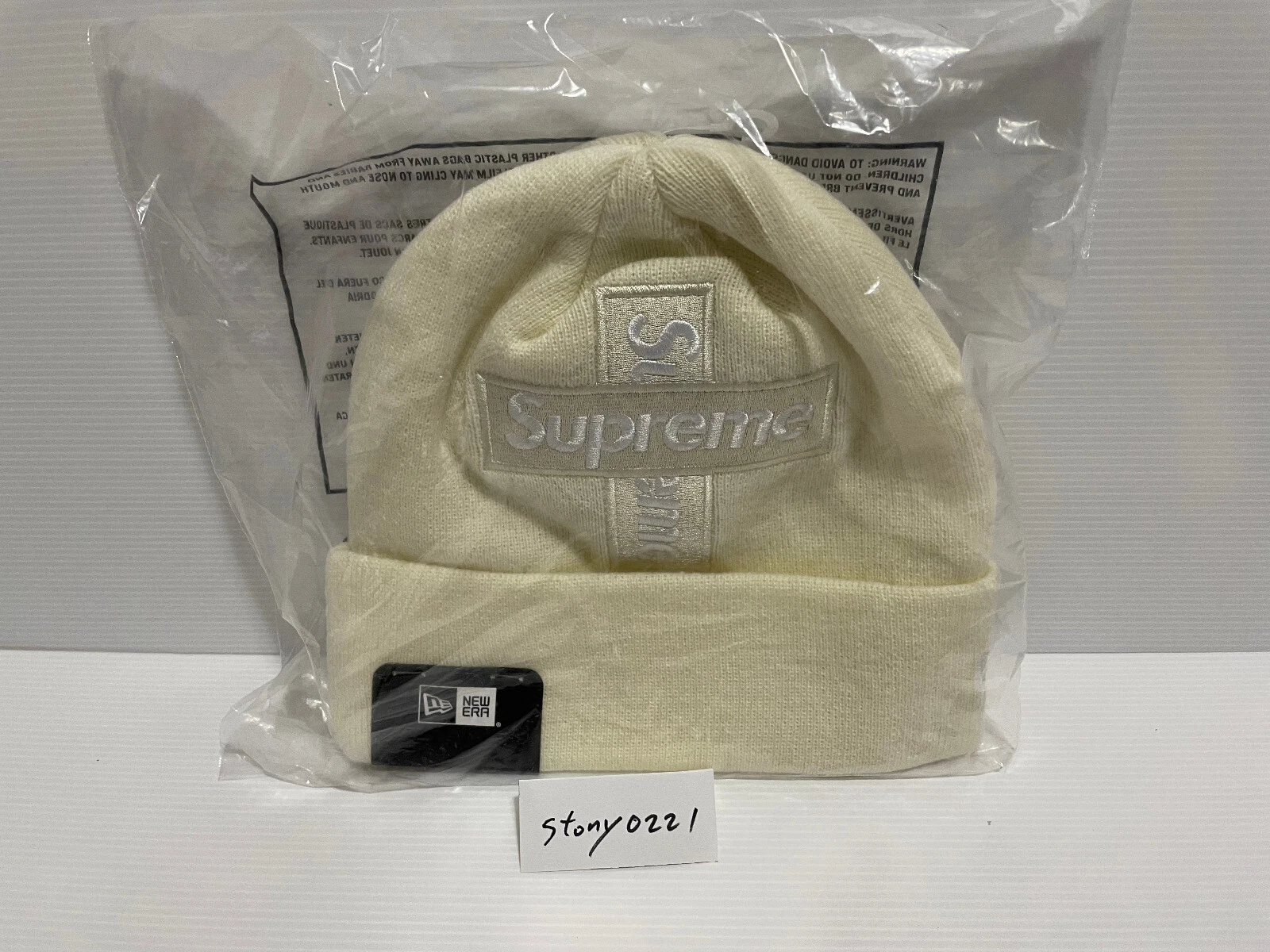 Boîte croisée Supreme x New Era logo beanie naturelle (FW20)