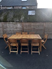 Blooma Denia teak garden table with fold out centre leaf and set of 8 Chairs