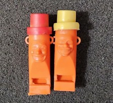 VINTAGE LOT OF 2 PLASTIC WHISTLES FUNNY FACES  HATS TOTEM HONG KONG 2.5"