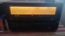 technics black  se-a70 power amplifier. Wood sides