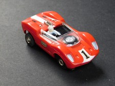 Aurora HO ThunderJet 1397 - 1966 McLaren Elva Mark II - Red w/ White Stripe