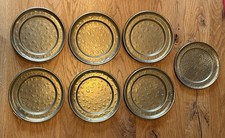 7 Vintage Messinguntersetzer mit Ornament-Muster