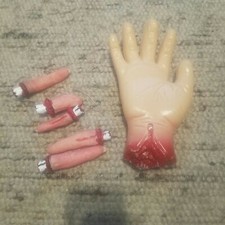 Halloween one fake severed hand and five fake severed fingers