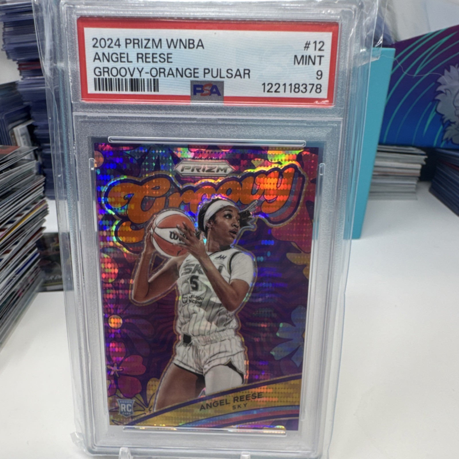 2024 Panini Prizm WNBA Angel Reese Groovy Orange Pulsar Rookie /75 #12 RC PSA 9