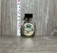 Florida Fishing Tackle Reel Oil Glass bottle Barracuda Antique Vintage Lure (SM)