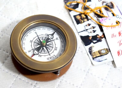 The Artisan's Compass: Exquisite Brass Craftsmanship with Magnifying Glass