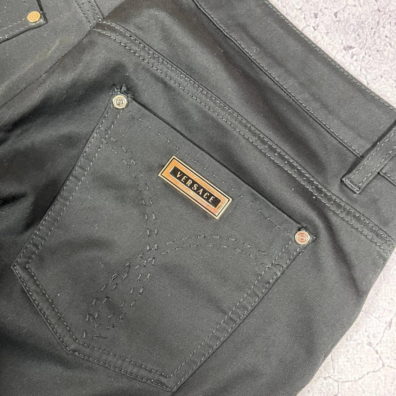 Pantalone casual Gianni Versace con logo tascabile nero taglia 31