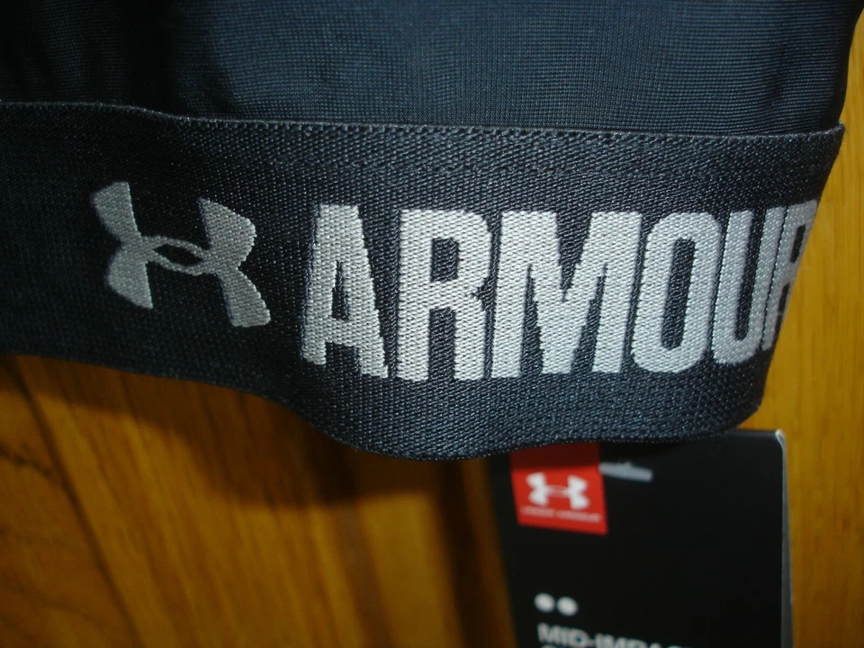 NUEVO CON ETIQUETAS SUJETADOR DEPORTIVO UNDER ARMOUR IMPACTO MEDIO MUJER SM/P NEGRO Foto 3 de 4