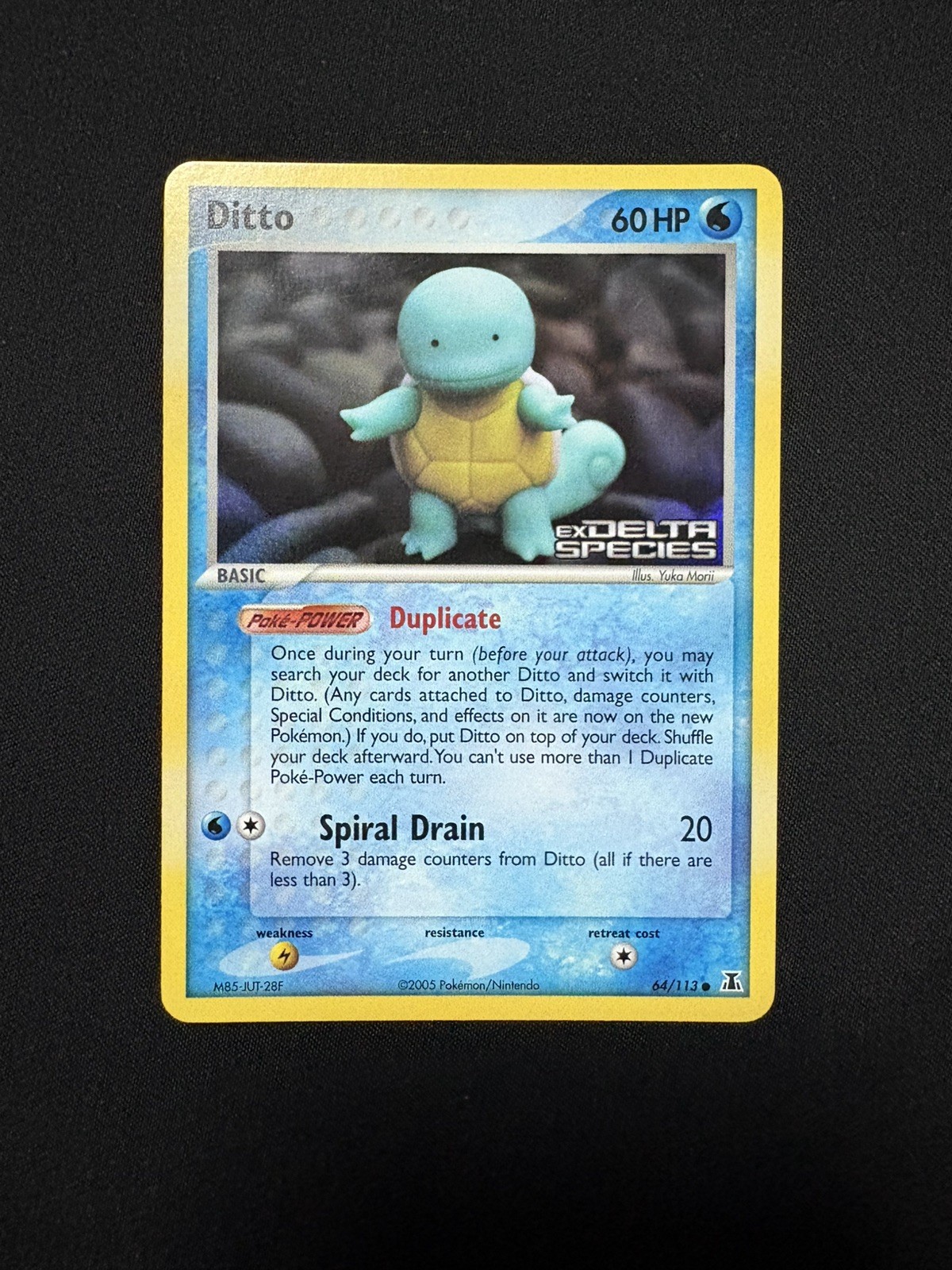 Ditto - (Squirtle) 064/113 Delta Species Reverse Holo NM