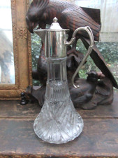 Claret Jug  Crystal Cut Glass Star Cut Bottom 1900,s Silver Plated Top Antique