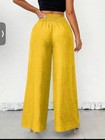 Unity Pantalones anchos yellow y sueltos para mujer con decoración de cade — photo 4