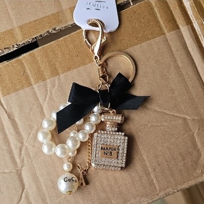 Coco CHANEL: Pearls, Perfume, and the Little Black Dress Keychain | eBay