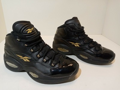 allen iverson black and gold shoes
