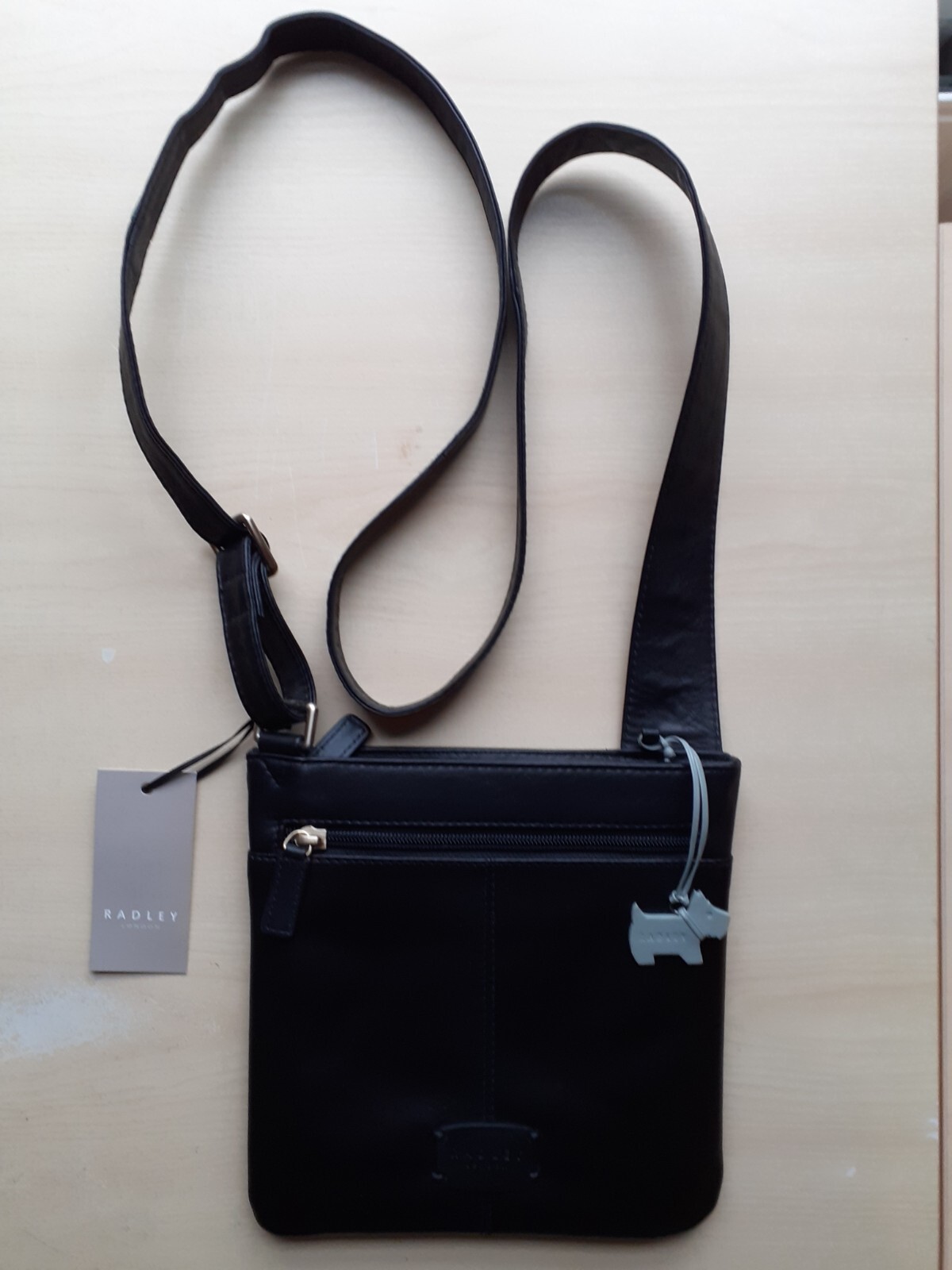 Radley Cross Body slim black leather handbag with side pocket, new with