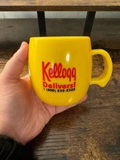 Vintage Yellow Kellogg “Kellogg Delivers! Bulk or Bag!” Plastic Mug
