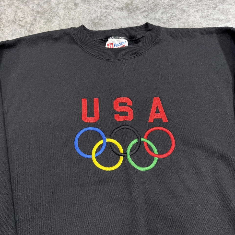 Sudadera de los Juegos Olímpicos de Estados Unidos para hombre grande negra suéter cuello redondo bordada Hanes Foto 2 de 4
