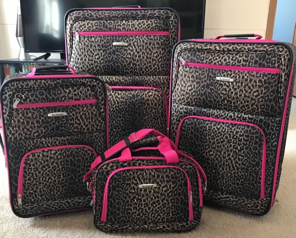 Rockland 4 Piece Luggage Set Softside Expandable 14" 29" 24" 28" Pink Leopard - Image 3 of 4