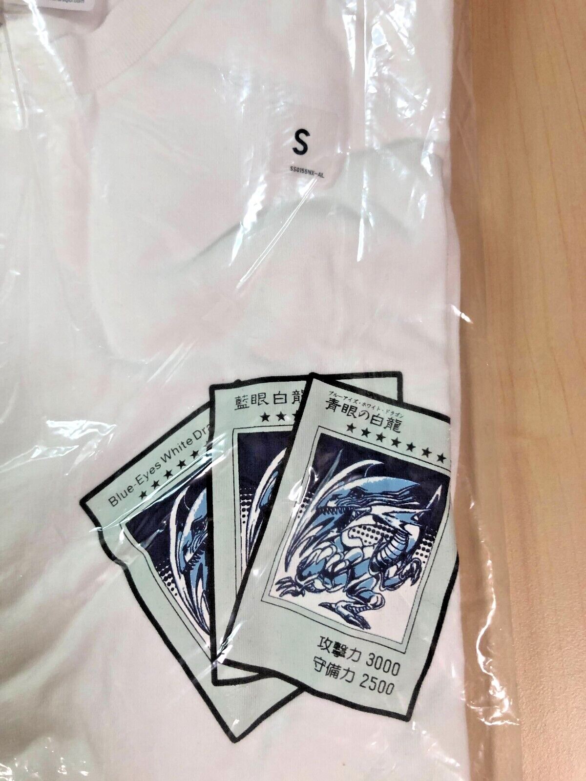 uniqlo blue eyes white dragon shirt