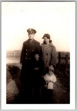 Vtg B W Snapshot Family WWII Soldier in Uniform Woman Children Outdoors 1940s