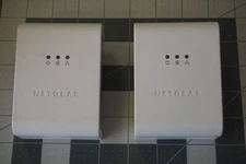 Two Netgear Powerline Adapters ( Xe104 & Xet1001 ) 85mbps Ethernet Switch...