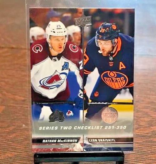 Nathan MacKinnon, Leon Draisaitl #449 Hockey Cards 2022 Upper Deck trading card — raw and PSA graded price guide