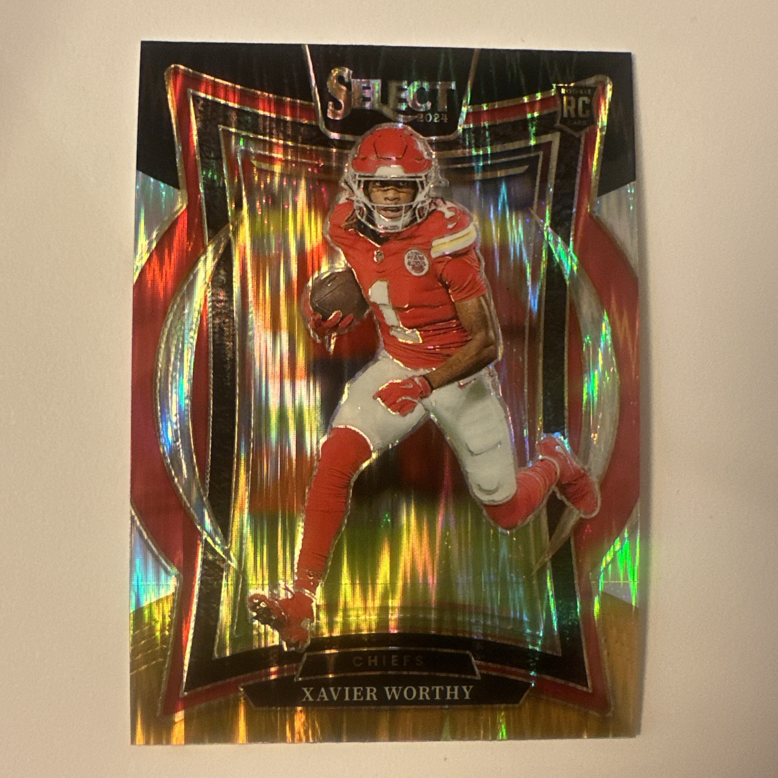 2024 Panini Select - Concourse Xavier Worthy #32 Red & Yellow Shock Prizm (RC)