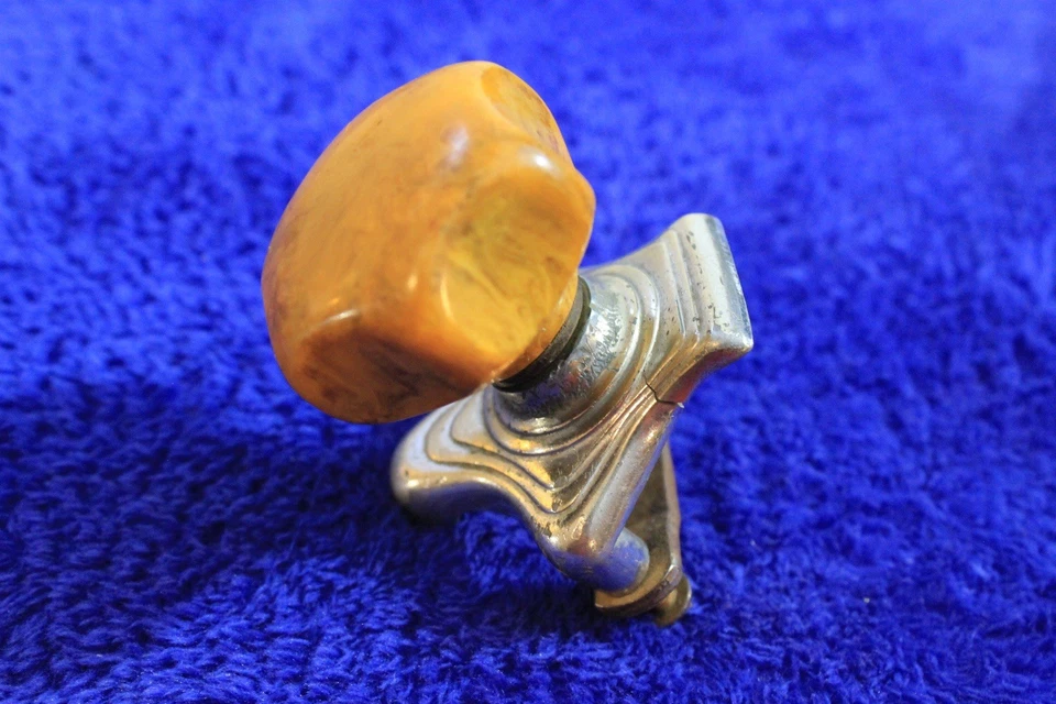 Accesorio de perilla giratoria de baquelita Newton de colección para volante Foto 3 de 4