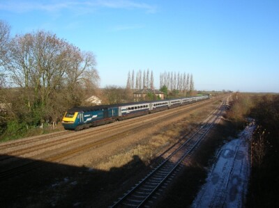 Photo 6x4 Bolton Percy Station Long disused station. A train rushes towar c2008
